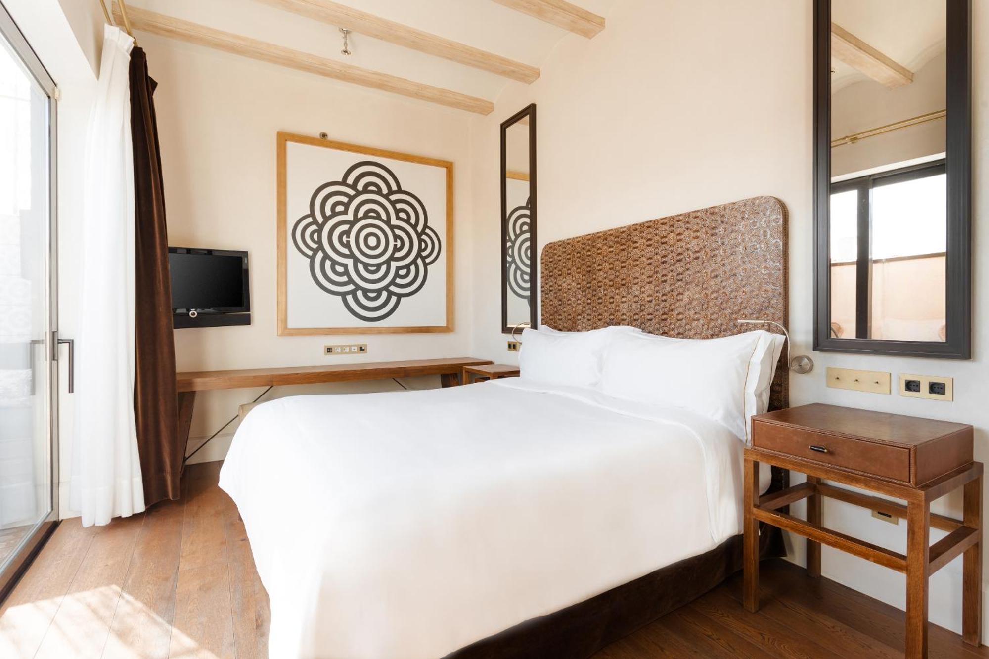 Do Placa Reial Powered By Sonder Barcelona Habitación foto A bedroom at the hotel